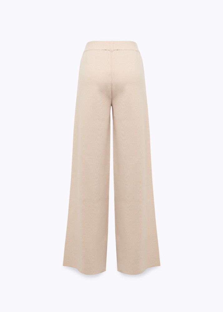 PANTALONI IN MAGLIA CON BOTTONI GIOIELLO